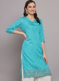 Poly Silk Casual Kurti in Turquoise Enhanced with Foil Print - 3