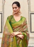 Pure Silk Trendy Saree in Green Enhanced with Woven - 1