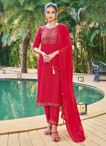 Rayon Trendy Salwar Kameez in Rani Enhanced with Embroidered