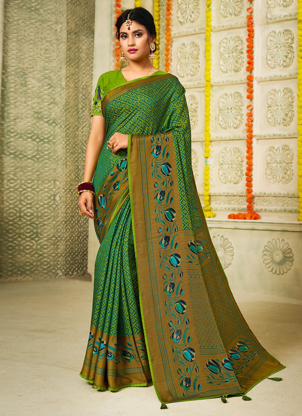 Remarkable Green Brasso Embroidered Traditional Saree for Festival
