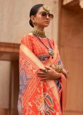 Remarkable Grey and Orange Patola Silk Border Designer Saree - 1
