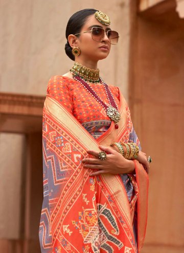 Remarkable Grey and Orange Patola Silk Border Designer Saree