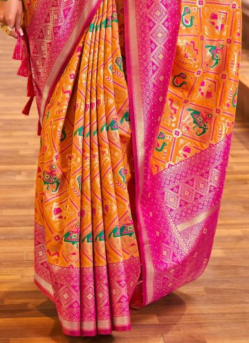 Remarkable Mustard and Rani Patola Silk Woven Designer Traditional Saree