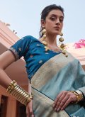 Remarkable Teal Viscose Woven Trendy Saree for Ceremonial - 1