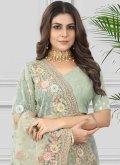 Sea Green color Embroidered Net Trendy Saree - 1