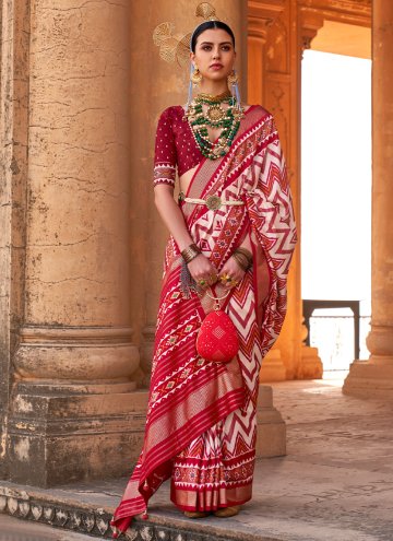 Silk Contemporary Saree in Red Enhanced with Patol