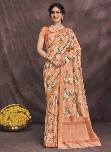 Silk Designer Saree in Orange Enhanced with Floral Print