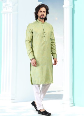 Silk Kurta Pyjama in Green Enhanced with Fancy work