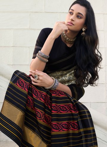 Silk Trendy Saree in Black and Cream Enhanced with Border