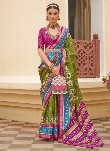 Silk Trendy Saree in Green Enhanced with Patola Print
