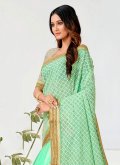Turquoise color Georgette Trendy Saree with Embroidered - 1