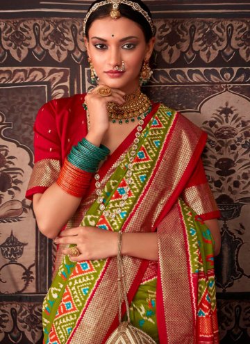 Tussar Silk Contemporary Saree in Green Enhanced with Patola Print