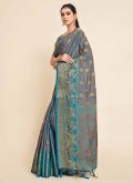 Woven Kanjivaram Silk Teal Trendy Saree - 1