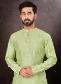 Art Dupion Silk Kurta Pyjama in Green Enhanced with Plain Work - 1