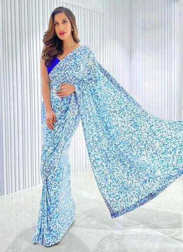 Georgette Trendy Saree in Blue Enhanced with Sequi