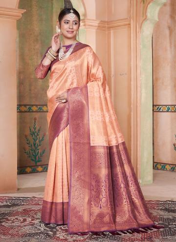 Kanjivaram Silk Trendy Saree in Peach Enhanced with Woven