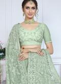 Net Trendy Saree in Green Enhanced with Aari Work - 1