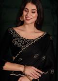 Remarkable Black Georgette Satin Cutwork Trendy Saree for Ceremonial - 1