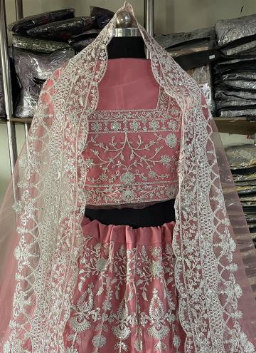 Remarkable Pink Net Embroidered Designer Lehenga Choli