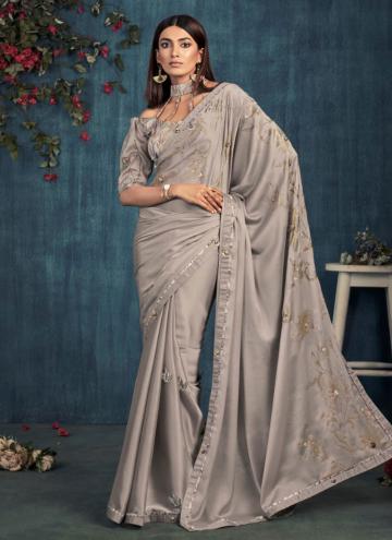 Silk Traditional Saree in Silver Enhanced with Border